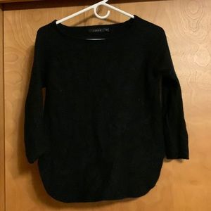Black cashmere sweater.